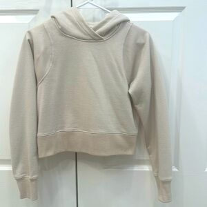 Lululemon hoodie. Size: 4. Color: cream with metallic gold threading.